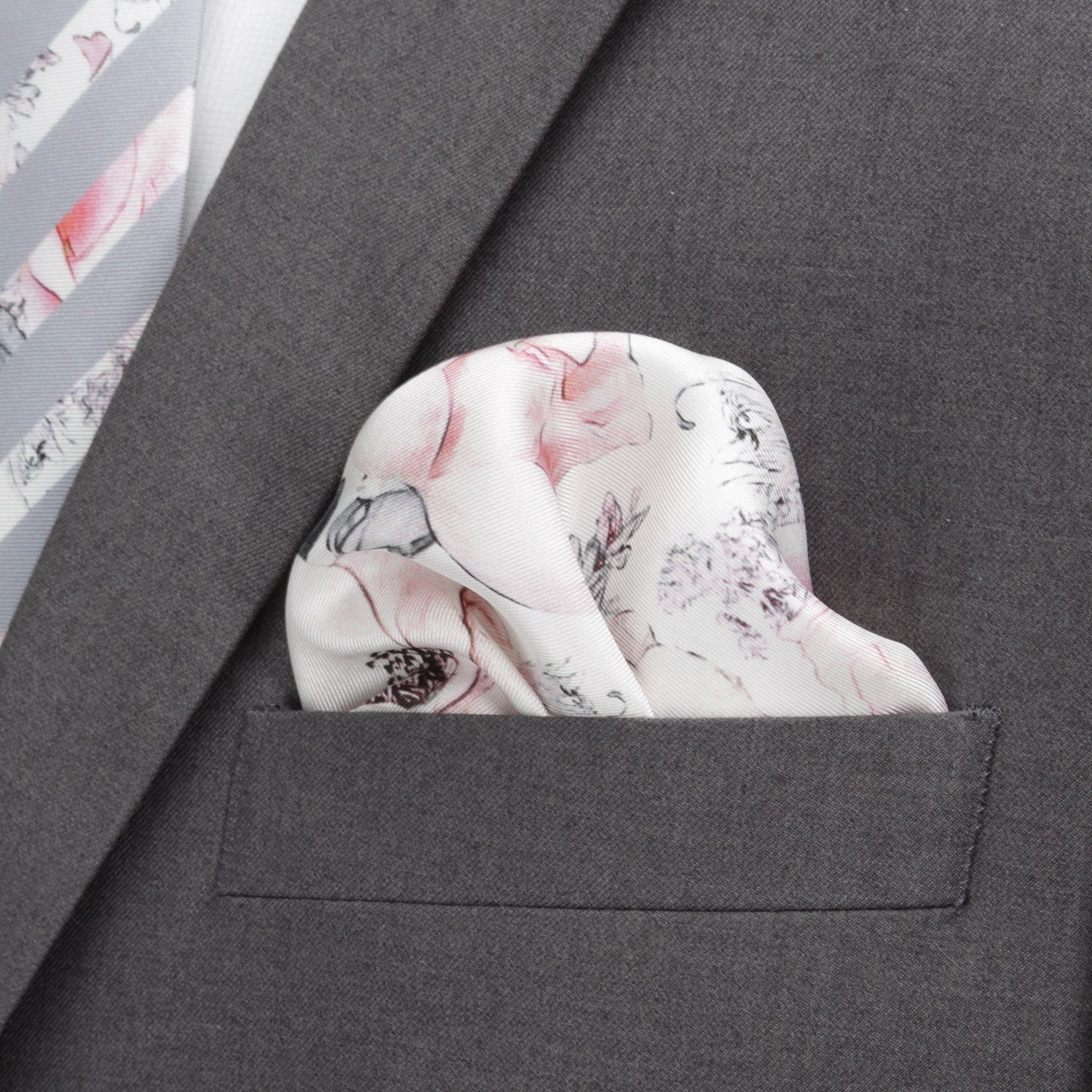 The Painted Floral Gray Necktie and Pocket Square Gift Set by Cufflinks.com features a vintage-inspired white design with pink and gray flowers—perfect for elevating your formal wardrobe.