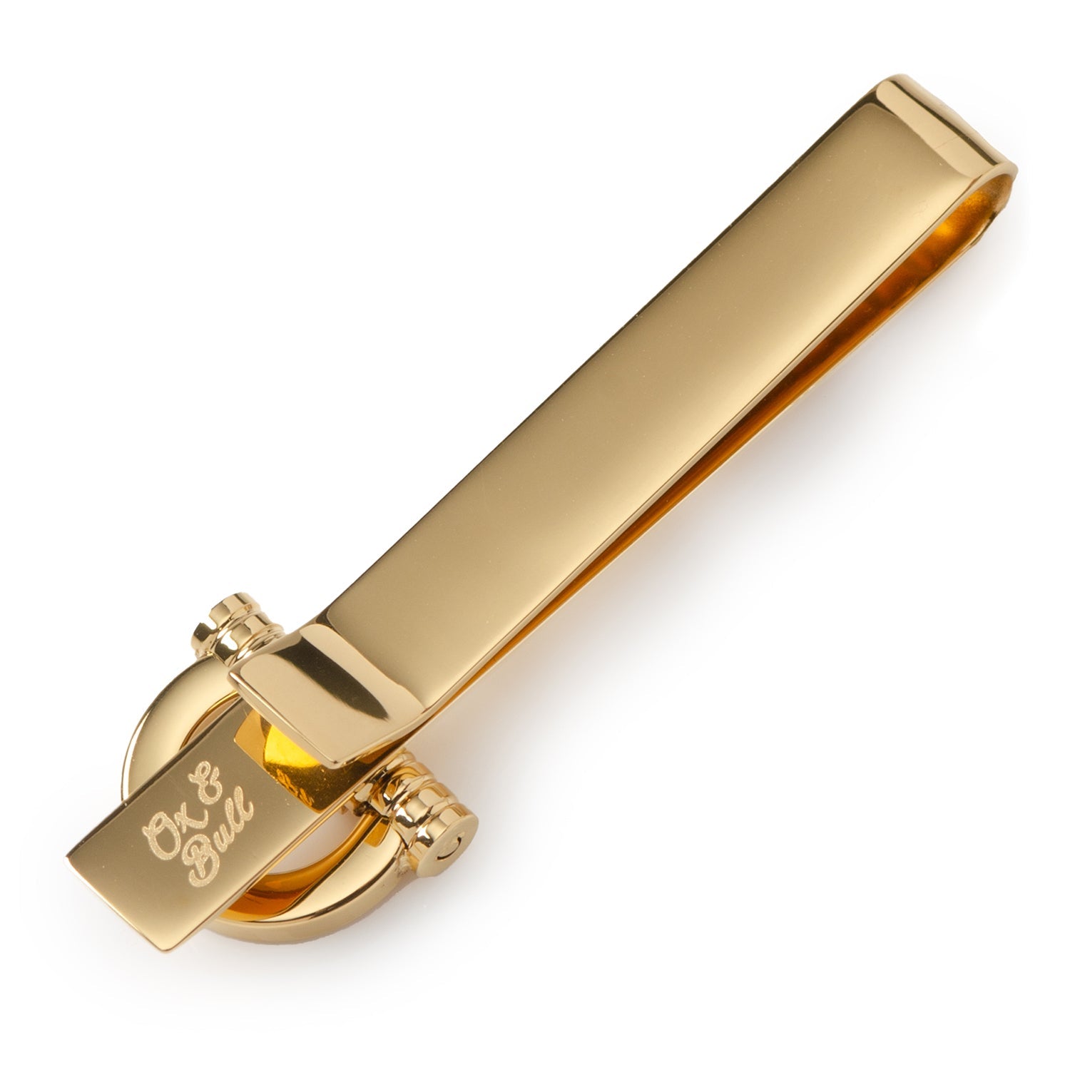 The Horse Bit Gold Stainless Steel Tie Bar from Cufflinks.com features a polished gold finish and decorative clasp, offering a refined men’s accessory inspired by classic horse bit design.