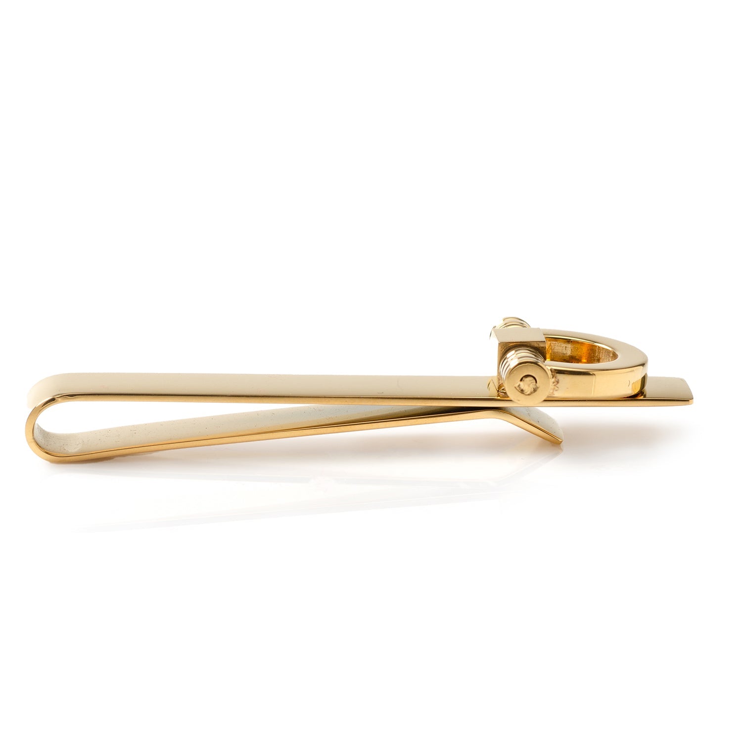 The Horse Bit Gold Stainless Steel Tie Bar from Cufflinks.com features a polished gold finish and decorative clasp, offering a refined men’s accessory inspired by classic horse bit design.