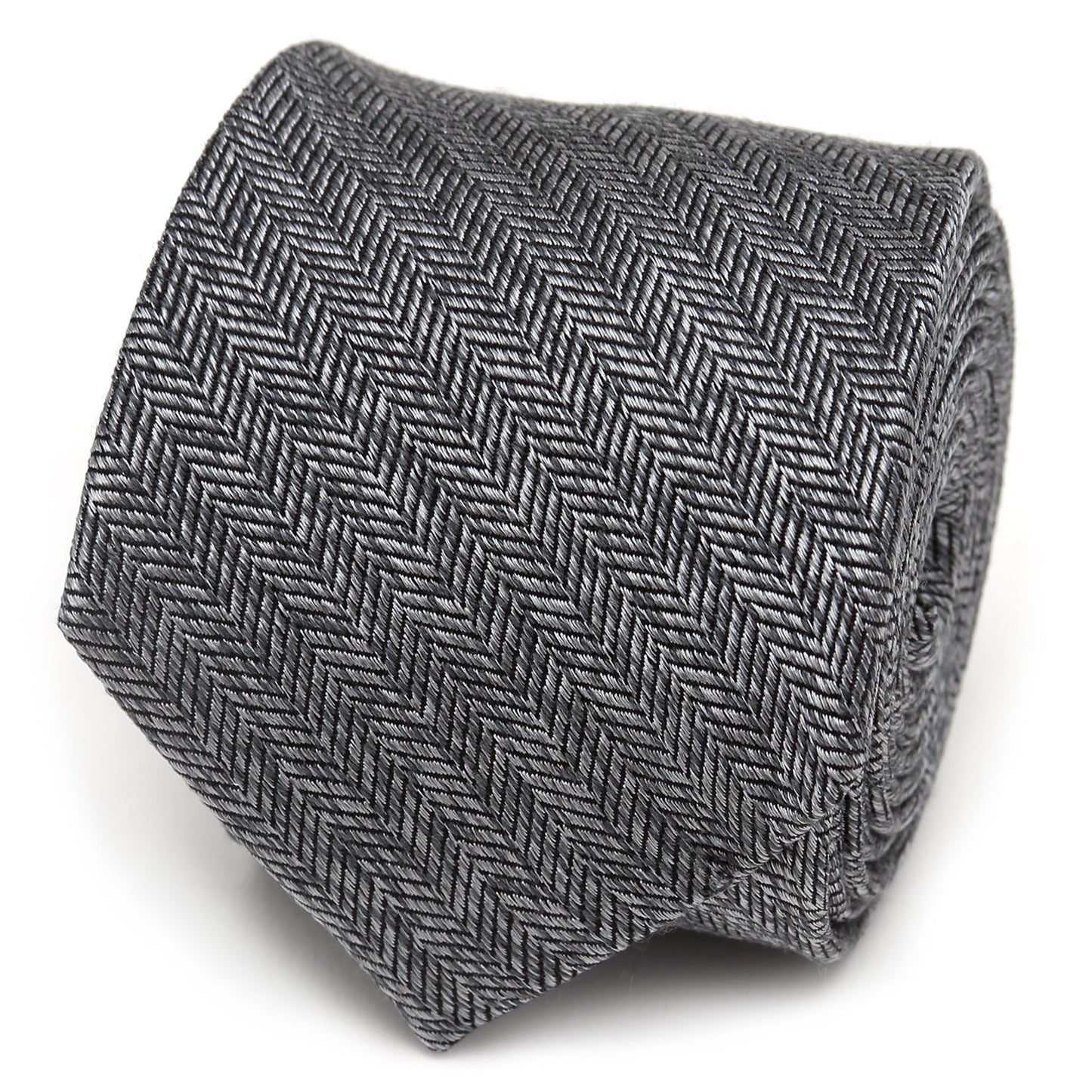 The Herringbone Men's Tie by Cufflinks.com features a rolled-up gray silk design with a classic herringbone stitch pattern on a white background.