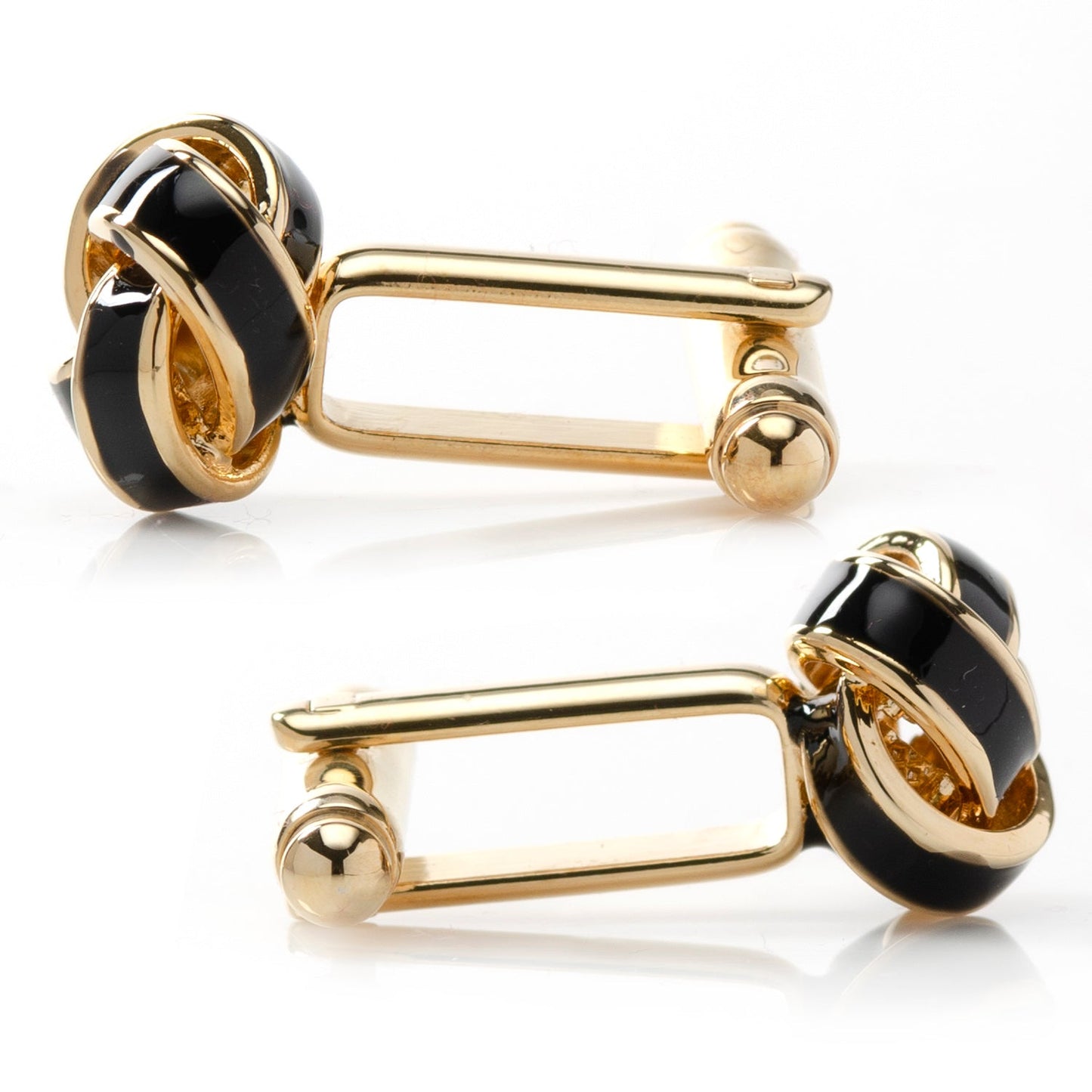 The Black and Gold Knot Cufflinks by Cufflinks.com feature a striking enamel finish, perfect for elevating any man's accessories, shown against a white background.