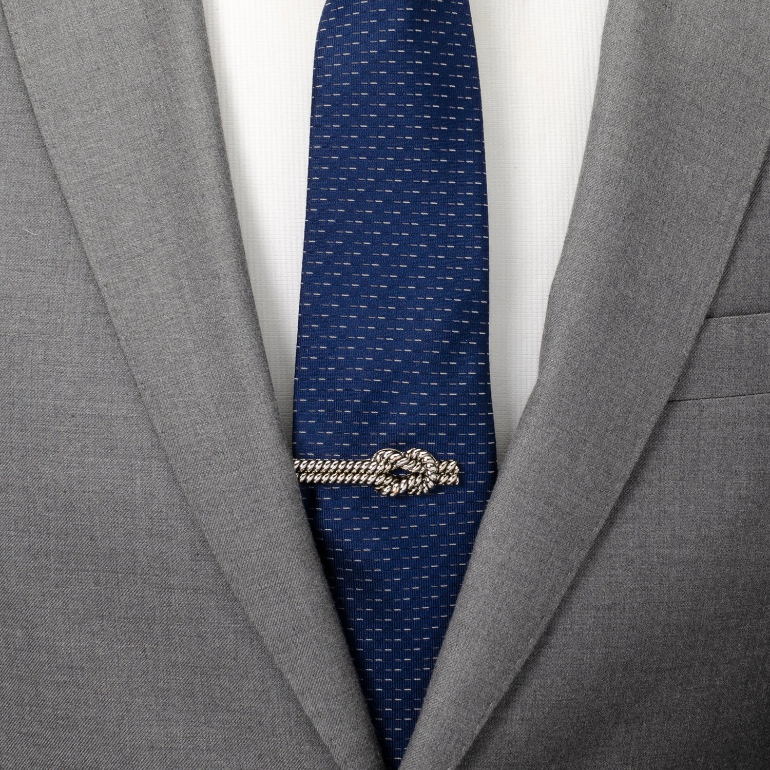 The Silver Knot Rope Tie Clip by Cufflinks.com features a twisted rope knot design in silver, shown on a white background.