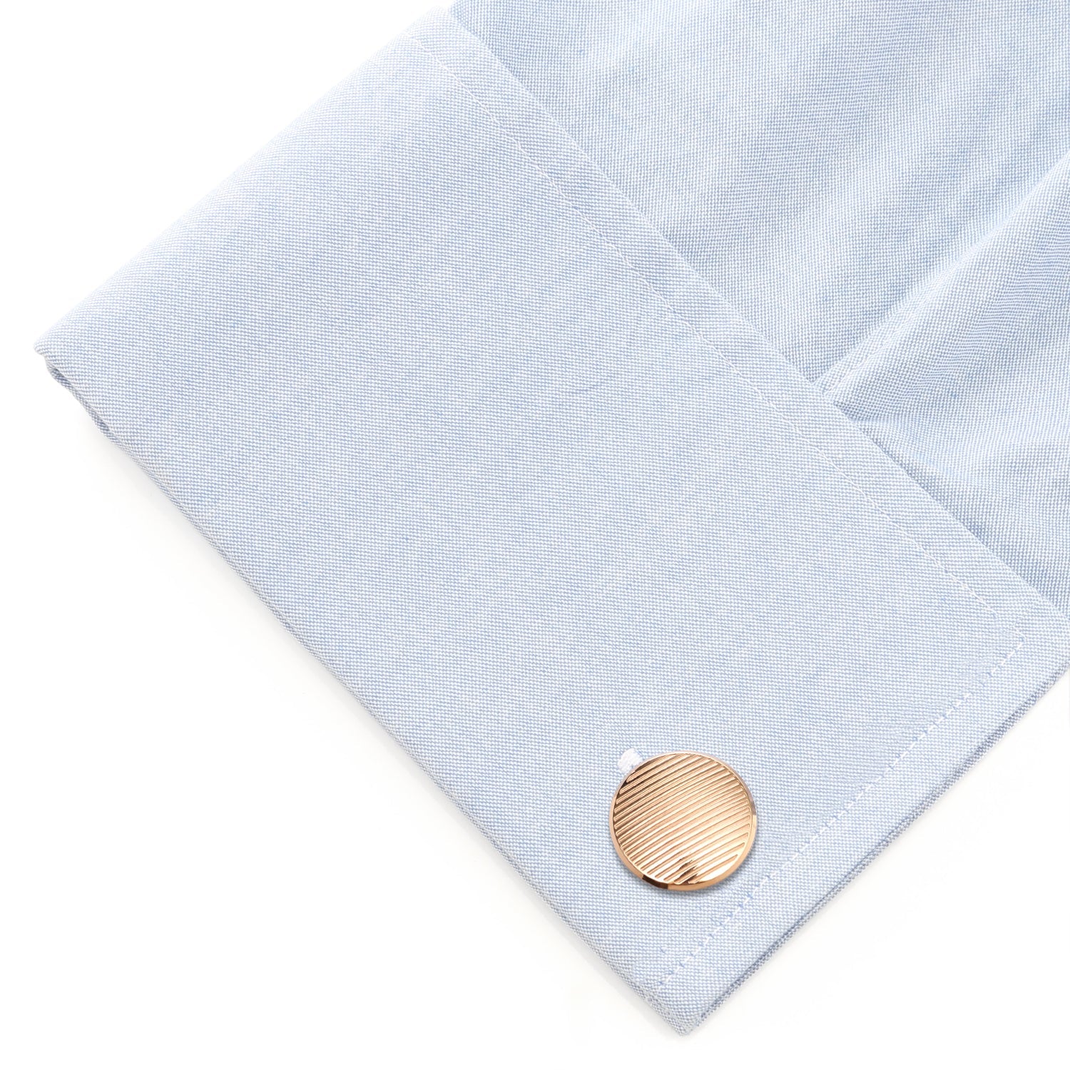 Rose Gold Line Stainless Steel Cufflinks by Cufflinks.com feature a round face with diagonal stripes, showcased against a white background—an elegant addition to men’s accessories.