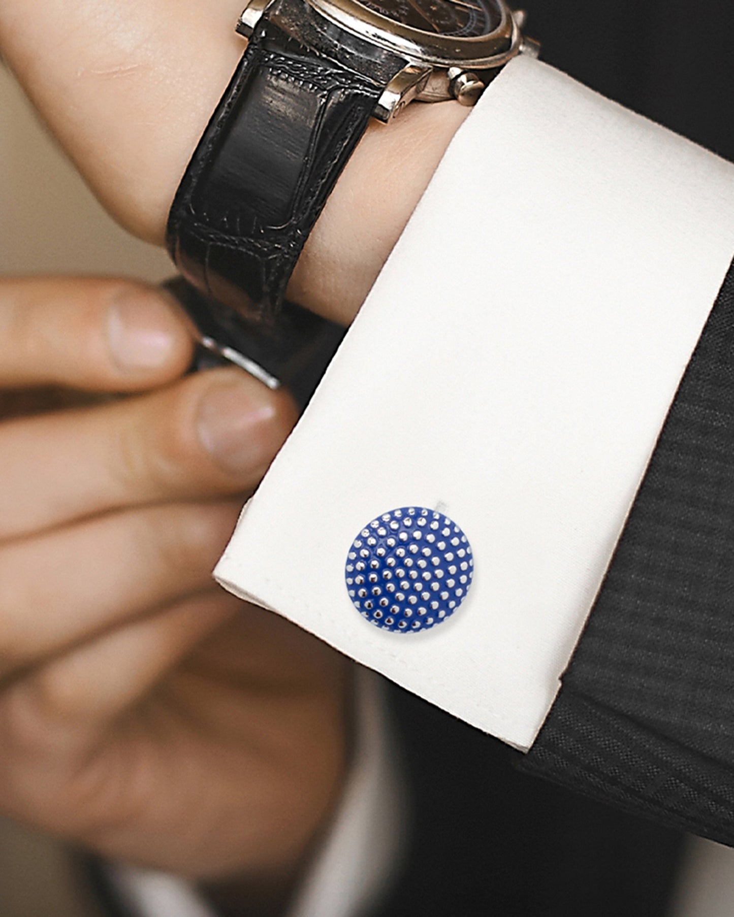 The Navy Circle Dot Texture Cufflinks by Cufflinks.com feature a blue round design with raised dot texture set in a shiny metal base.