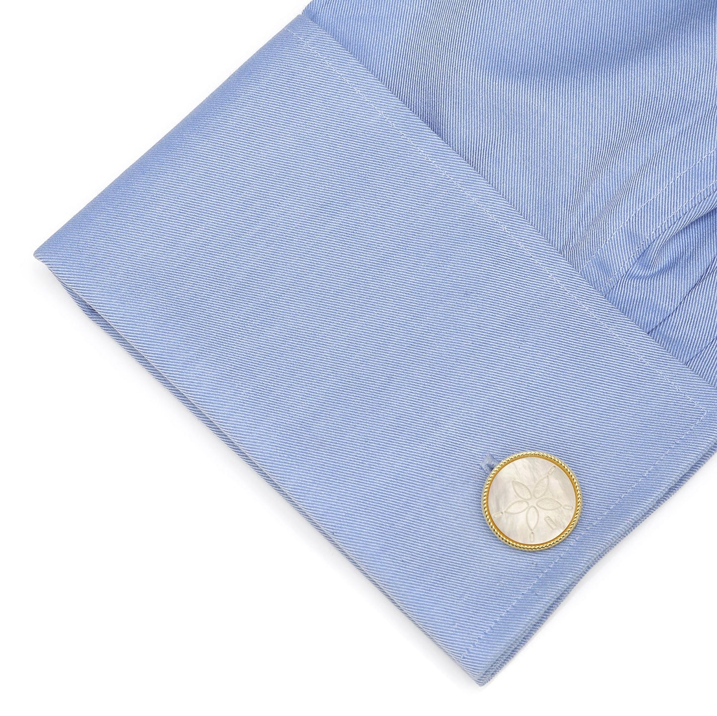 The Sand Dollar Cufflinks by Cufflinks.com feature round mother-of-pearl faces, each intricately engraved with a sand dollar design.