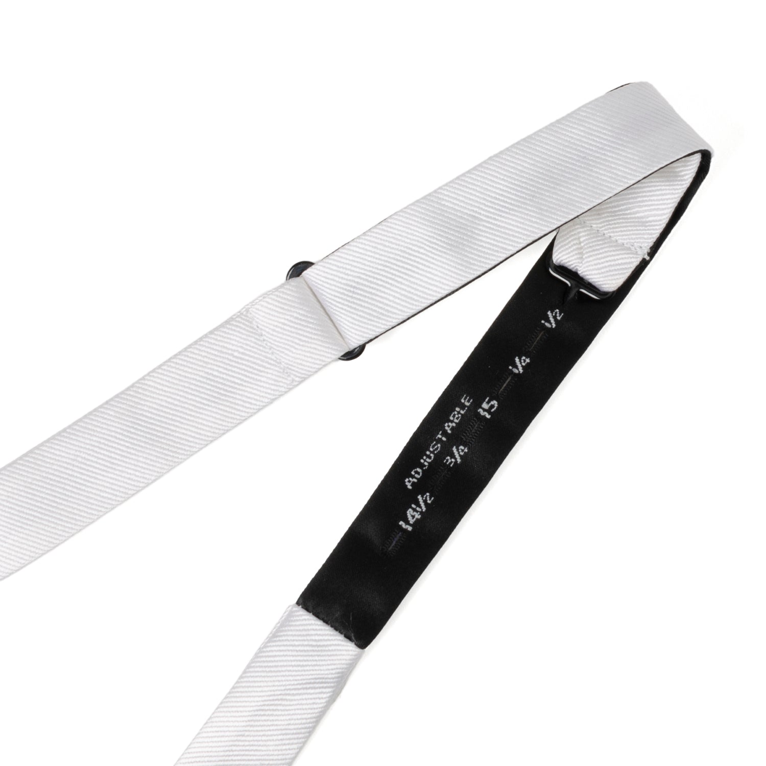 The White Silk Self Bow Tie by Cufflinks.com features ribbed silk fabric, an adjustable strap, and is shown tied and untied.