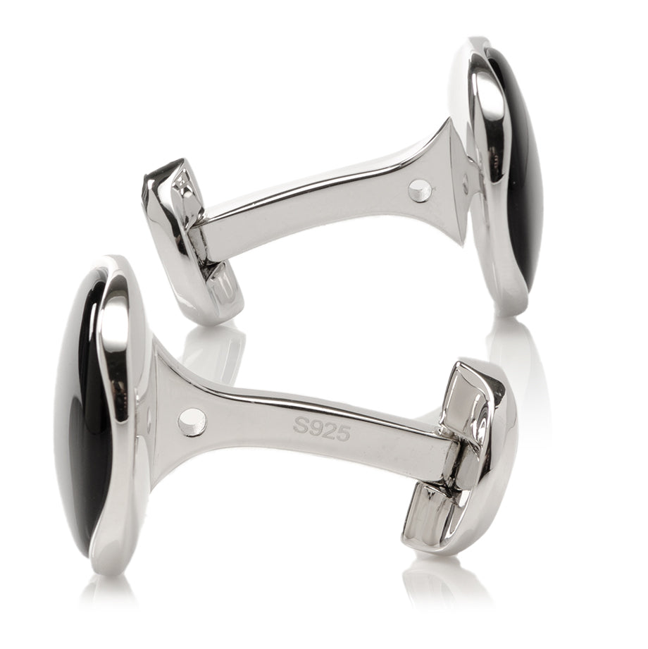 The Sterling Silver Classic Formal Onyx Cufflinks by Cufflinks.com feature oval-shaped onyx faces and are elegantly displayed on a white background.