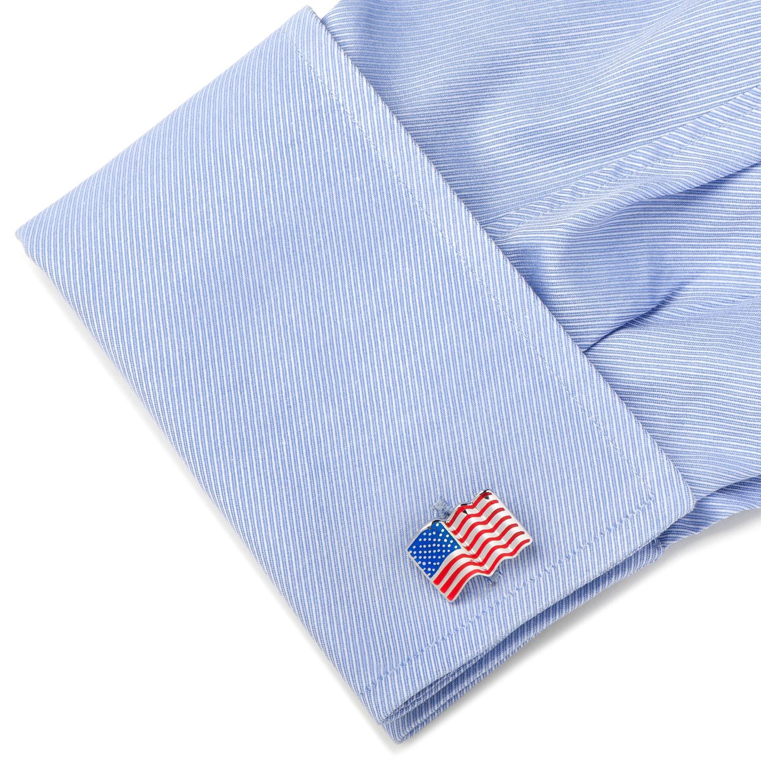 The Sterling Silver Waving American Flag Cufflinks by Cufflinks.com feature red and white stripes with a blue field and white dots—making them the perfect patriotic gift for any occasion.