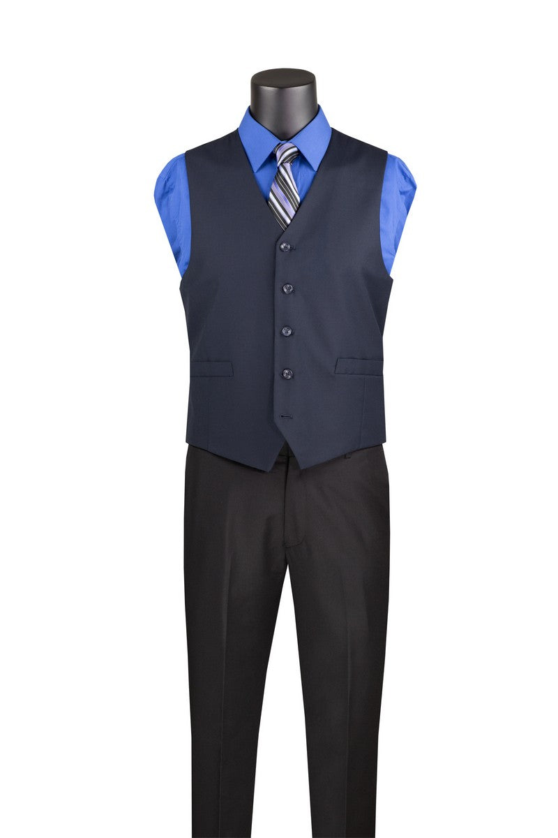 Mannequin wears the Vinci Suits Single Breasted 5 Button Vest Navy OV-900 over a blue dress shirt, striped tie, and black dress pants against a white background.