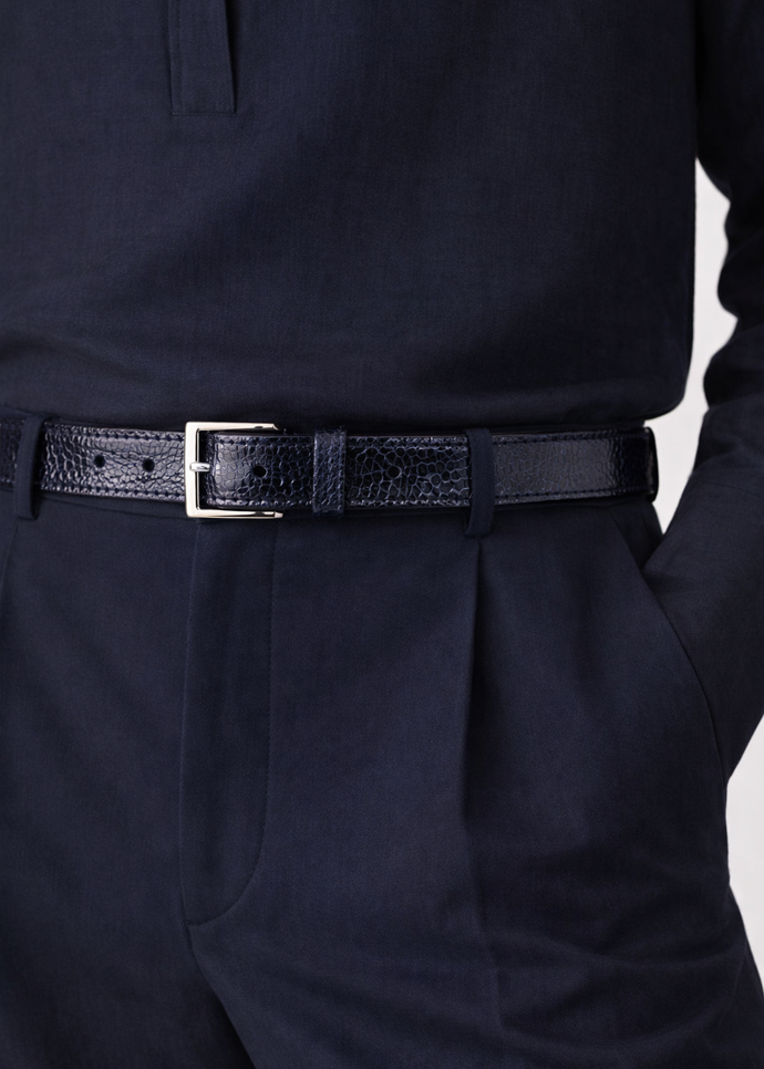 The BELVEDERE Belvedere Ostrich Leg Belt Navy 2000 features textured navy ostrich leg leather, a silver rectangular buckle, visible adjustment holes, and is adjustable in size 44.