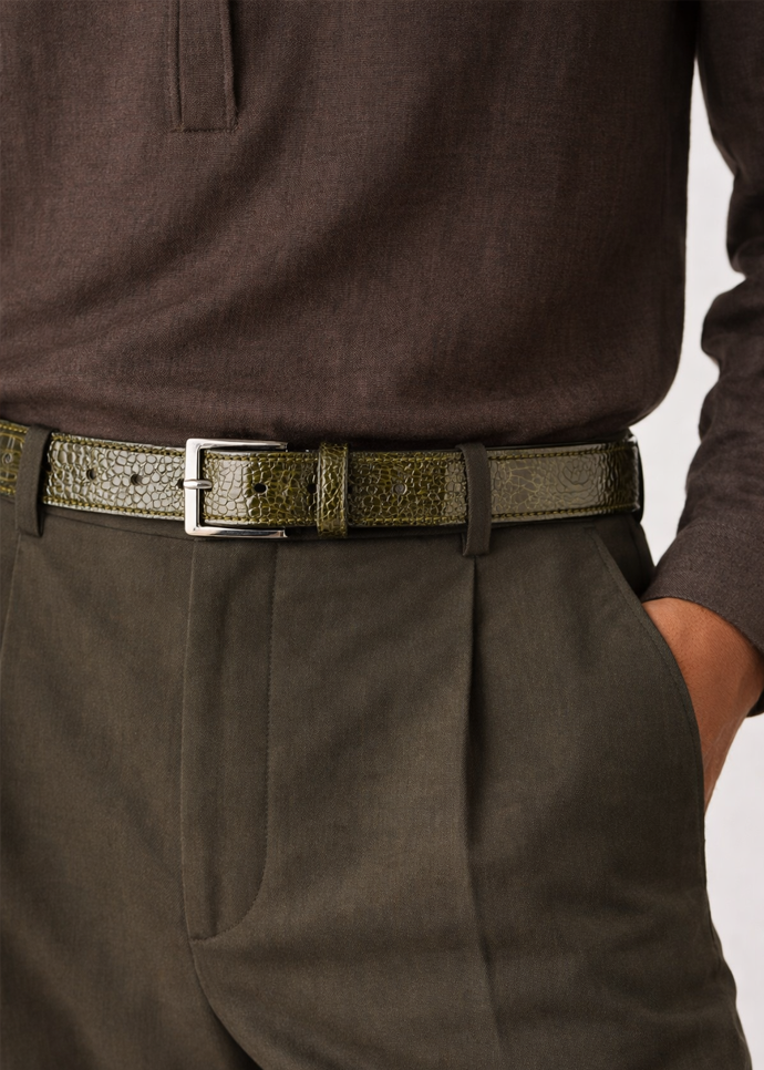 The BELVEDERE Belvedere Ostrich Leg Belt Olive 2000 features olive textured ostrich leather, a silver rectangular buckle, multiple adjustment holes, and a loop—stylish and comfortable for those needing a size 44 belt.