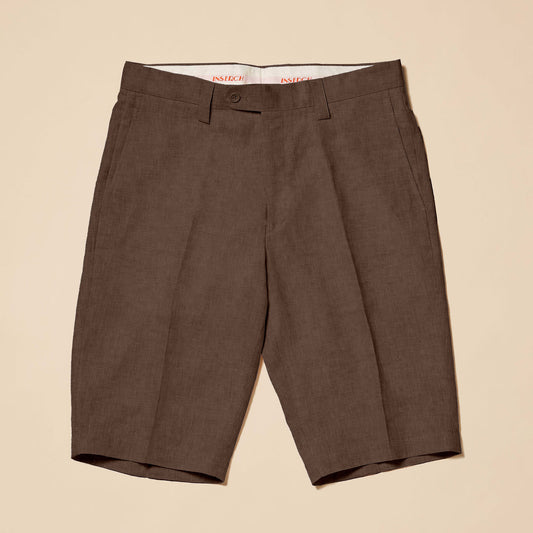 Inserch Premium Linen Flat Front Shorts (P21116-00024) in chocolate brown, knee-length with a modern fit, front zipper, and belt loops are laid flat on a beige background.