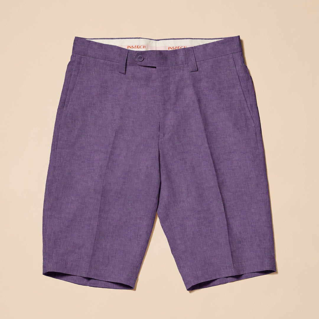 Inserch Premium Linen Flat Front Shorts (P21116-00126) in purple feature a modern fit, knee-length design with front pockets and belt loops on a beige background.