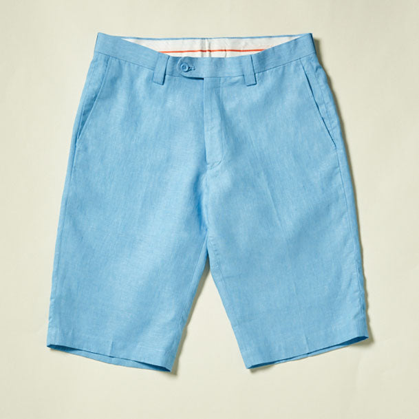 Inserch Linen Shorts P21116-00154 in Lake Blue by Inserch feature a modern fit, button and zipper front, belt loops, and side pockets, shown laid flat on a light background.
