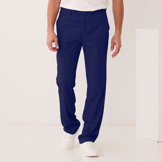 A person wearing Inserch Crepe Flat Front Pants P9356-00011 in navy blue by Inserch and white sneakers, standing against a plain white background.