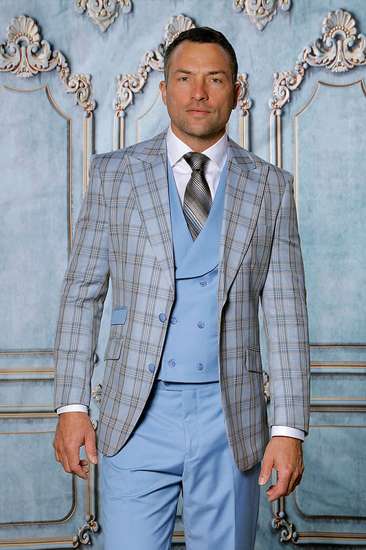 A man wears a MANZINI PARIS-4 Men's 3-Piece Tailored-Fit Plaid Business Suit in sapphire by Manzini, featuring a light blue vest and pants, standing before an ornate decorative background.