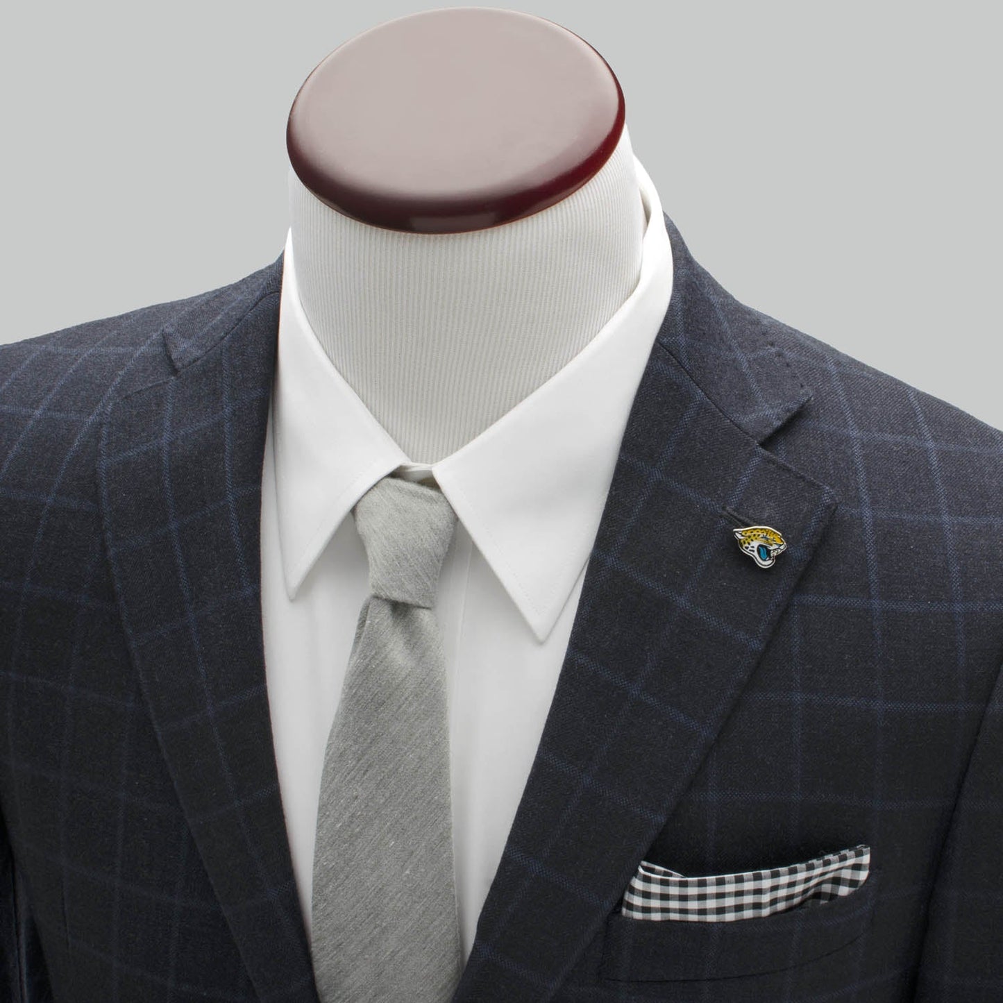 Show your team pride with the NFL Jacksonville Jaguars Lapel Pin by Cufflinks.com, featuring a stylized jaguar head in yellow, black, white, and blue—an ideal official accessory for dedicated fans.