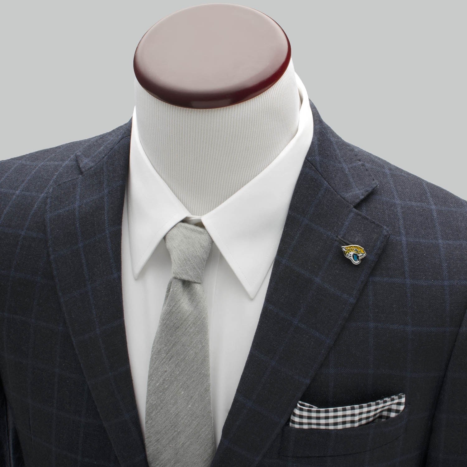 Show your team pride with the NFL Jacksonville Jaguars Lapel Pin by Cufflinks.com, featuring a stylized jaguar head in yellow, black, white, and blue—an ideal official accessory for dedicated fans.