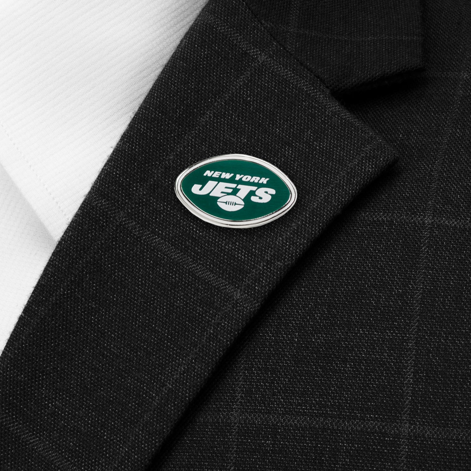 Show your team spirit with the NFL New York Jets Lapel Pin by Cufflinks.com, featuring the Jets logo and text on a silver and green oval— a great NFL accessory for fans.