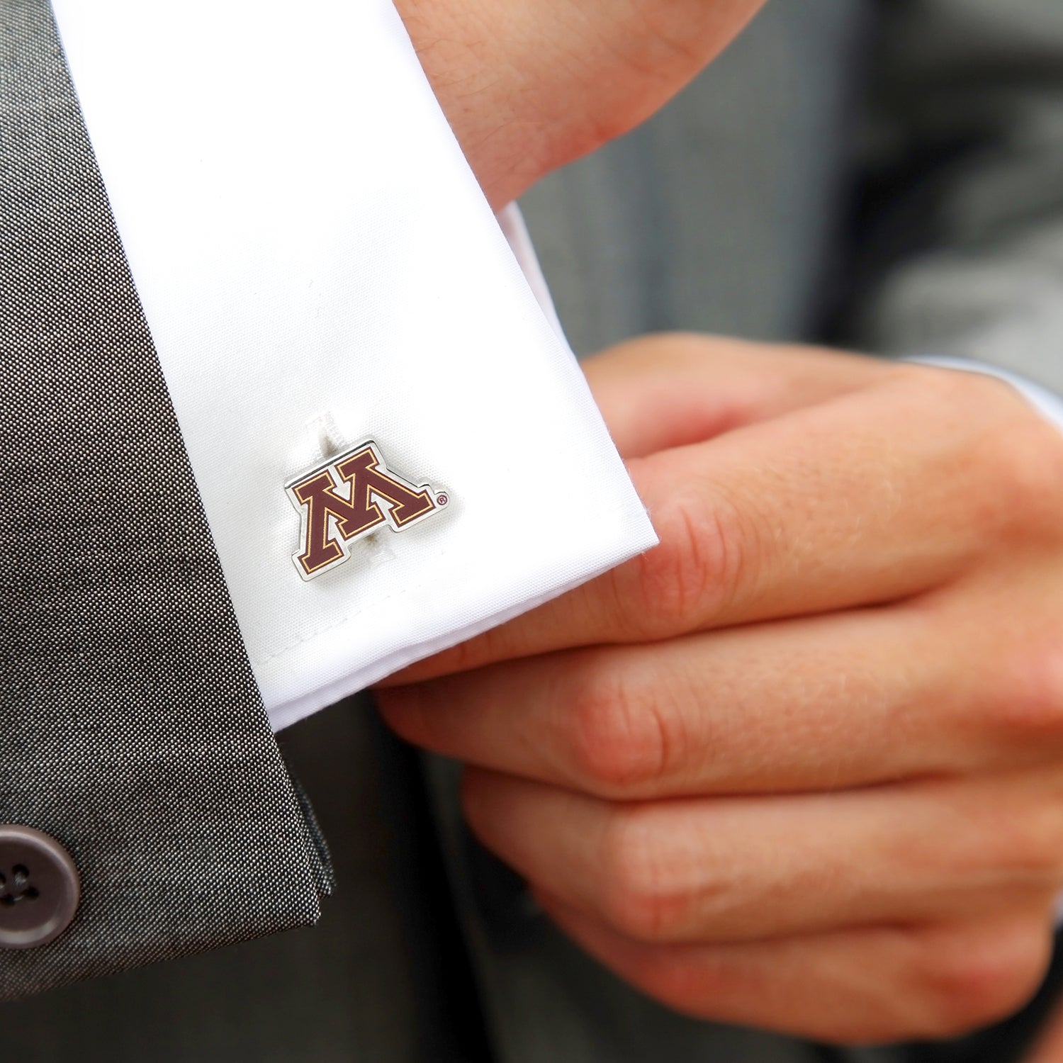 Show your team spirit with NCAA Minnesota Gophers Cufflinks by Cufflinks.com, featuring the maroon and gold "M" logo—ideal for Minnesota Gophers fans and a stylish accessory for any occasion.