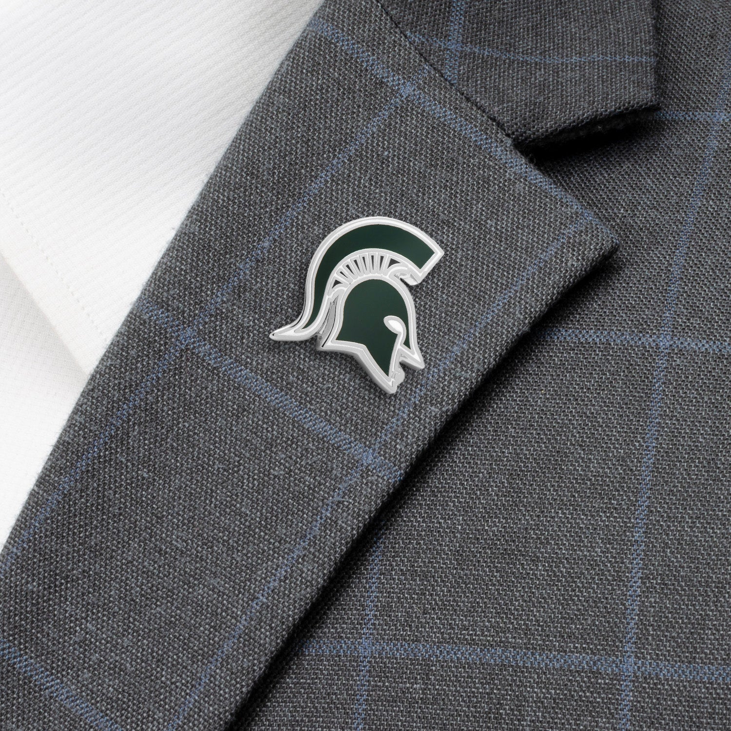 Show off your team pride with the NCAA Michigan State Spartans Lapel Pin by Cufflinks.com—a metallic, Spartan helmet-shaped pin in dark green and silver. Officially licensed, it's ideal for collectors and fans.