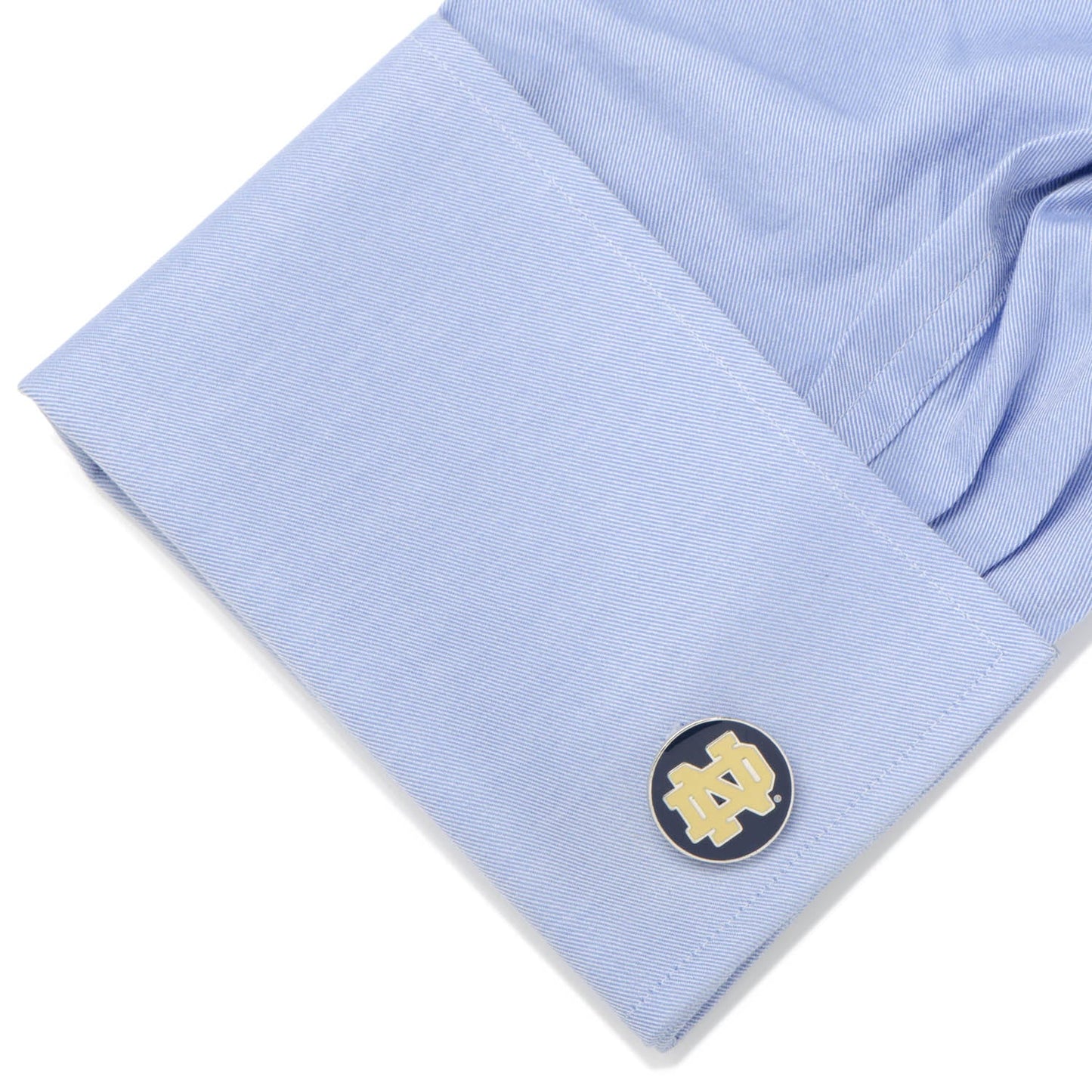 Show your team pride with NCAA Notre Dame University Cufflinks by Cufflinks.com, featuring a gold interlocking "ND" logo on a dark blue round background—ideal accessories for any Fighting Irish fan.