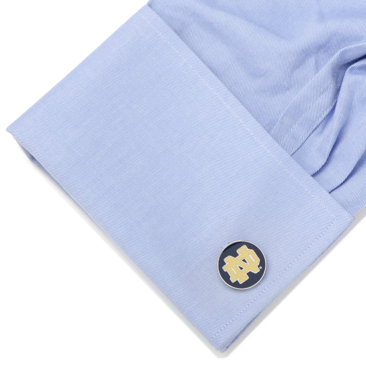 Show your team pride with NCAA Notre Dame University Cufflinks by Cufflinks.com, featuring a gold interlocking "ND" logo on a dark blue round background—ideal accessories for any Fighting Irish fan.
