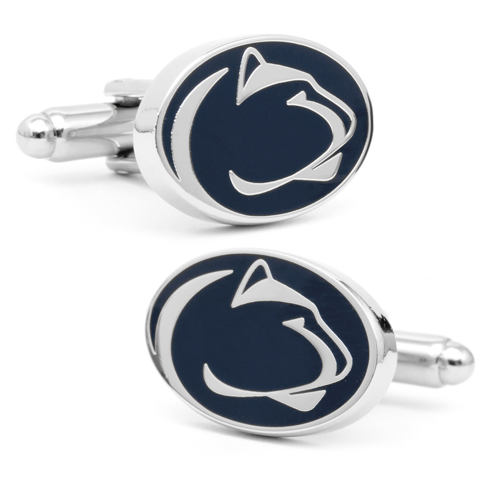 The NCAA Penn State University Cufflinks and Tie Clip Gift Set by Cufflinks.com features silver accessories with a navy emblem and white Nittany Lion head—perfect for any fan or alum.