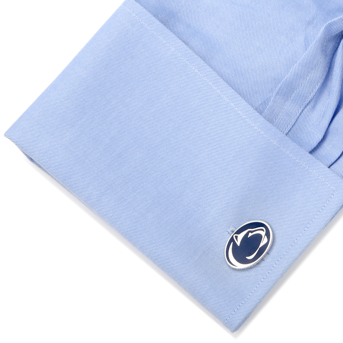 The NCAA Penn State University Cufflinks and Tie Clip Gift Set by Cufflinks.com features silver accessories with a navy emblem and white Nittany Lion head—perfect for any fan or alum.