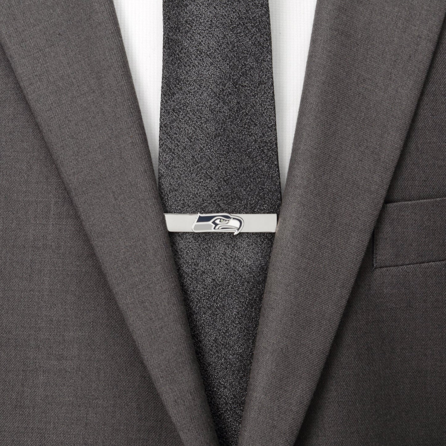 The NFL Seattle Seahawks Cufflinks and Tie Bar Gift Set from Cufflinks.com features the team’s logo in blue, white, and green on a silver base—ideal NFL accessories for any dedicated fan.