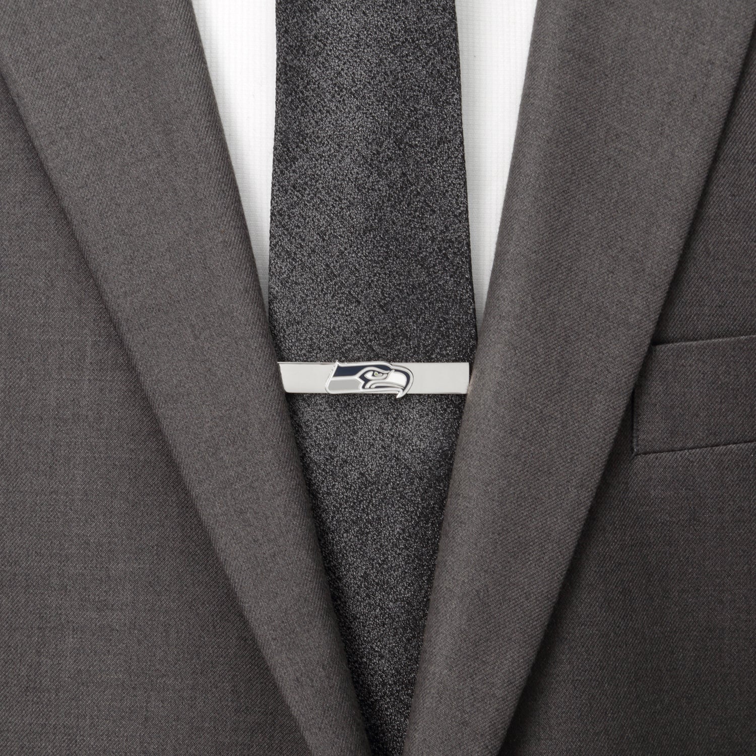 The NFL Seattle Seahawks Cufflinks and Tie Bar Gift Set from Cufflinks.com features the team’s logo in blue, white, and green on a silver base—ideal NFL accessories for any dedicated fan.