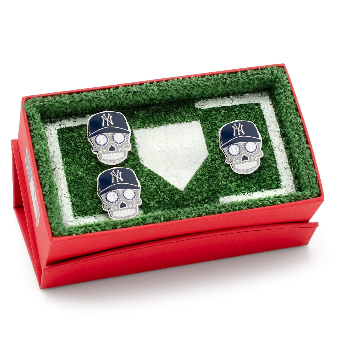 The MLB New York Yankees Sugar Skull Cufflinks & Lapel Pin Gift Set from Cufflinks.com features baseball-inspired skull cufflinks—a unique gift for Día de Muertos fans.