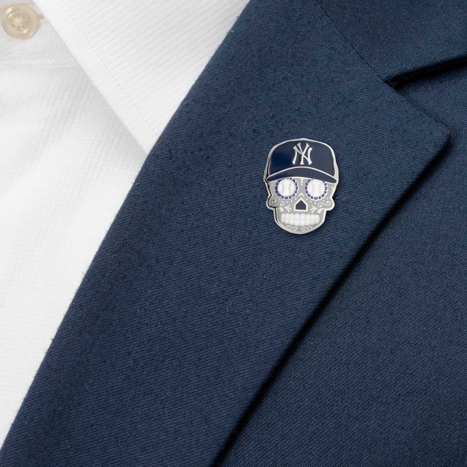 The MLB New York Yankees Sugar Skull Cufflinks & Lapel Pin Gift Set from Cufflinks.com features baseball-inspired skull cufflinks—a unique gift for Día de Muertos fans.