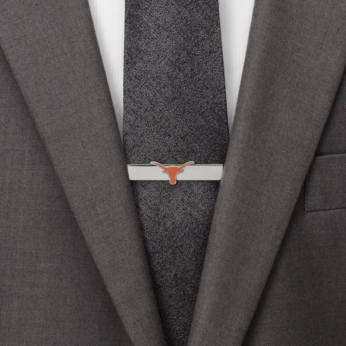 The NCAA University of Texas Longhorns Tie Bar by Cufflinks.com showcases a silver finish with an orange longhorn emblem on the front.
