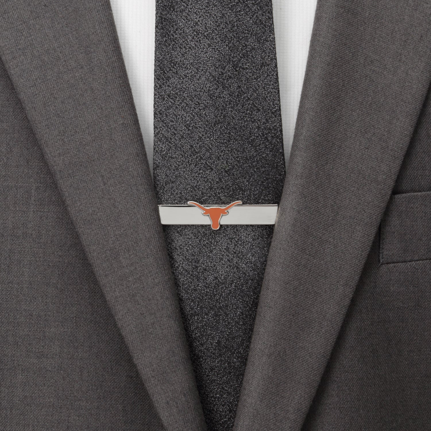 The NCAA University of Texas Longhorns Tie Bar by Cufflinks.com showcases a silver finish with an orange longhorn emblem on the front.