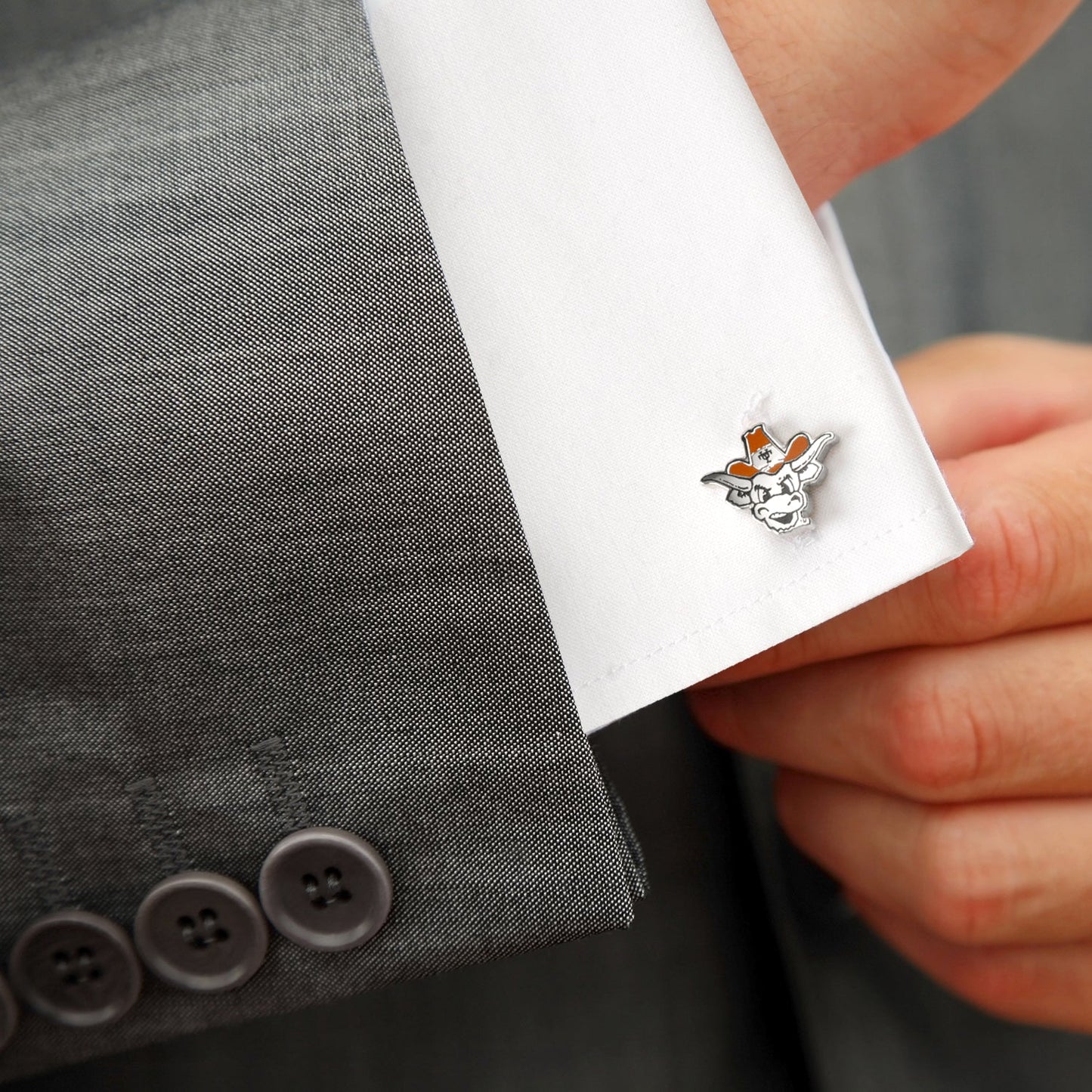 Show your team spirit with NCAA University of Texas Bevo Cufflinks by Cufflinks.com, featuring a cartoon longhorn steer in an orange cowboy hat with "UT" on the front—perfect for any Bevo fan!.