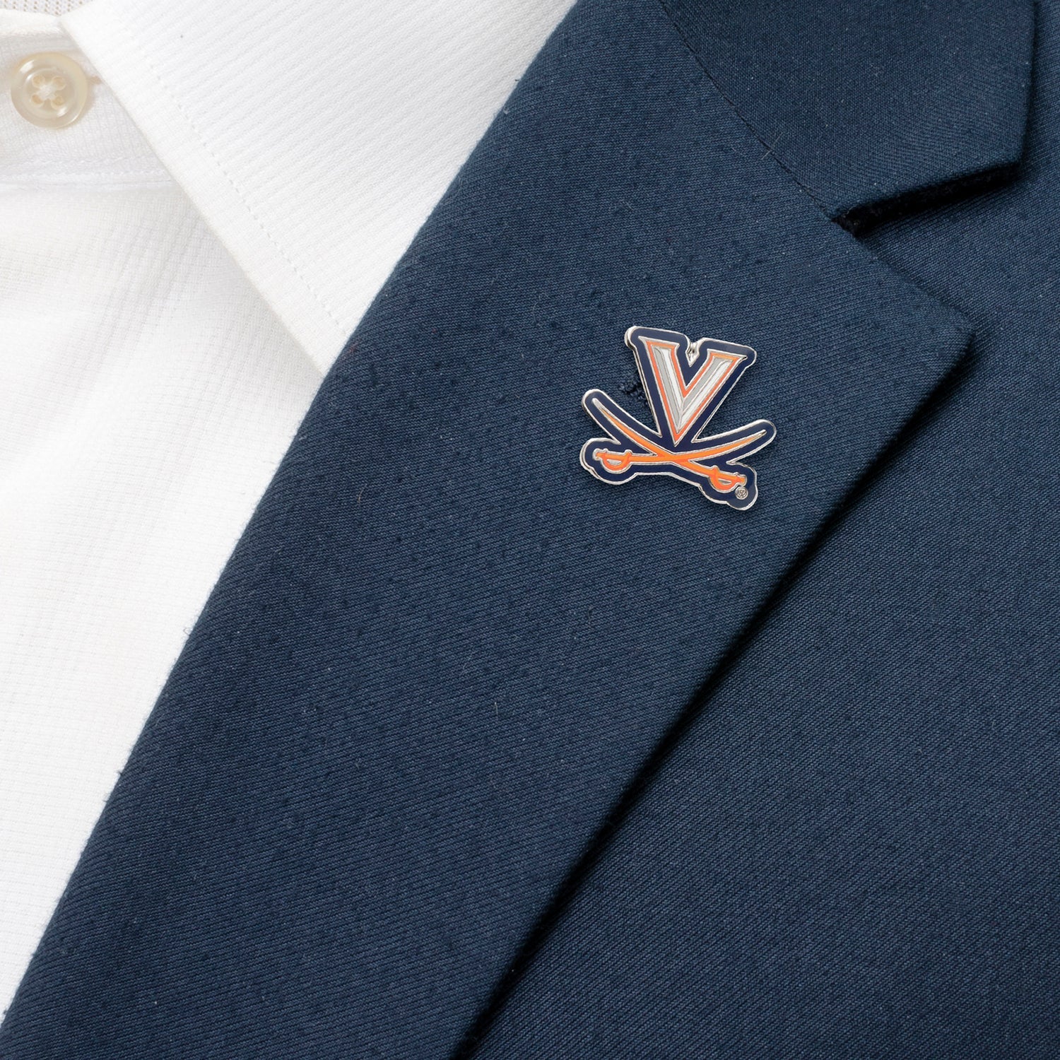 Display your UVA pride with the NCAA University of Virginia Cavaliers Lapel Pin by Cufflinks.com, featuring the classic navy "V" and orange sabres. It's a must-have accessory for any Cavaliers fan or alumnus.