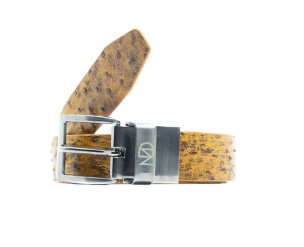 The Domenico Belt Antique Paja by Marco Di Milano is a light brown genuine ostrich belt with a silver rectangular buckle, featuring the brand’s signature logo on the metal—a refined accessory that perfectly complements luxury footwear.