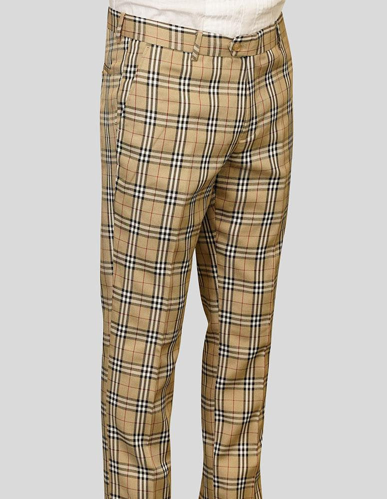 A person wearing Statement Clothing's Plaid Slim Fit Pants in tan.