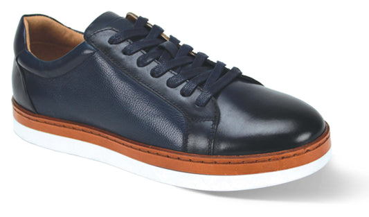 The Giovanni Porter Navy Leather Shoes by GIOVANNI are a navy low top sneaker distinguished by brown accents and a white sole, enhanced with a leather welt for added durability.