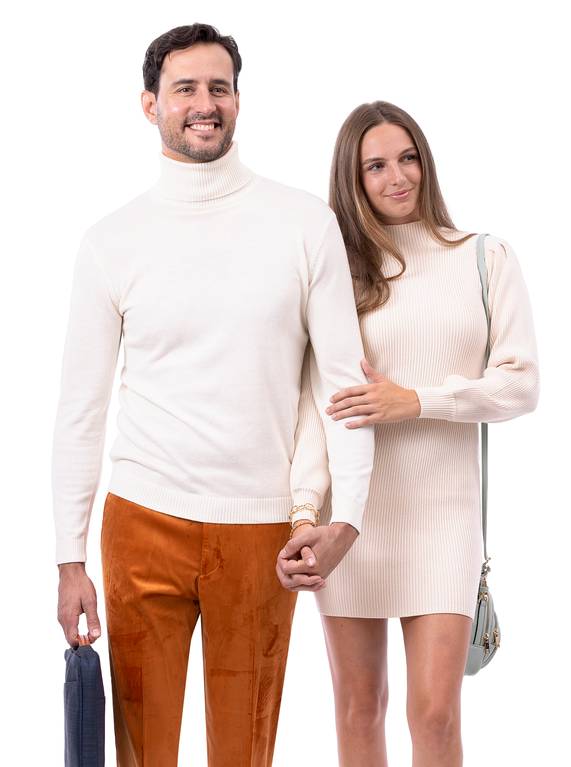 A man and woman stand together, both wearing light-colored sweaters. The man holds an EJ Samuel Rust Pants PV01 bag as they hold hands. The woman smiles.
