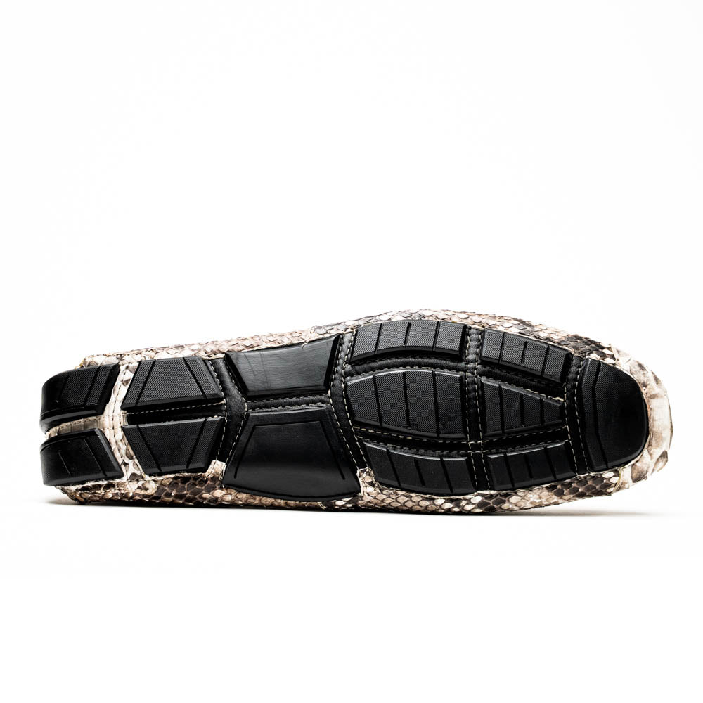 Pair of Marco Di Milano’s Pia Natural men’s loafers, crafted from exotic python skin leather and featuring a sleek metal buckle detail, displayed against a white background. One luxury loafer stands upright while the other is tilted to reveal the sole, showcasing the refined craftsmanship of these signature driver shoes.