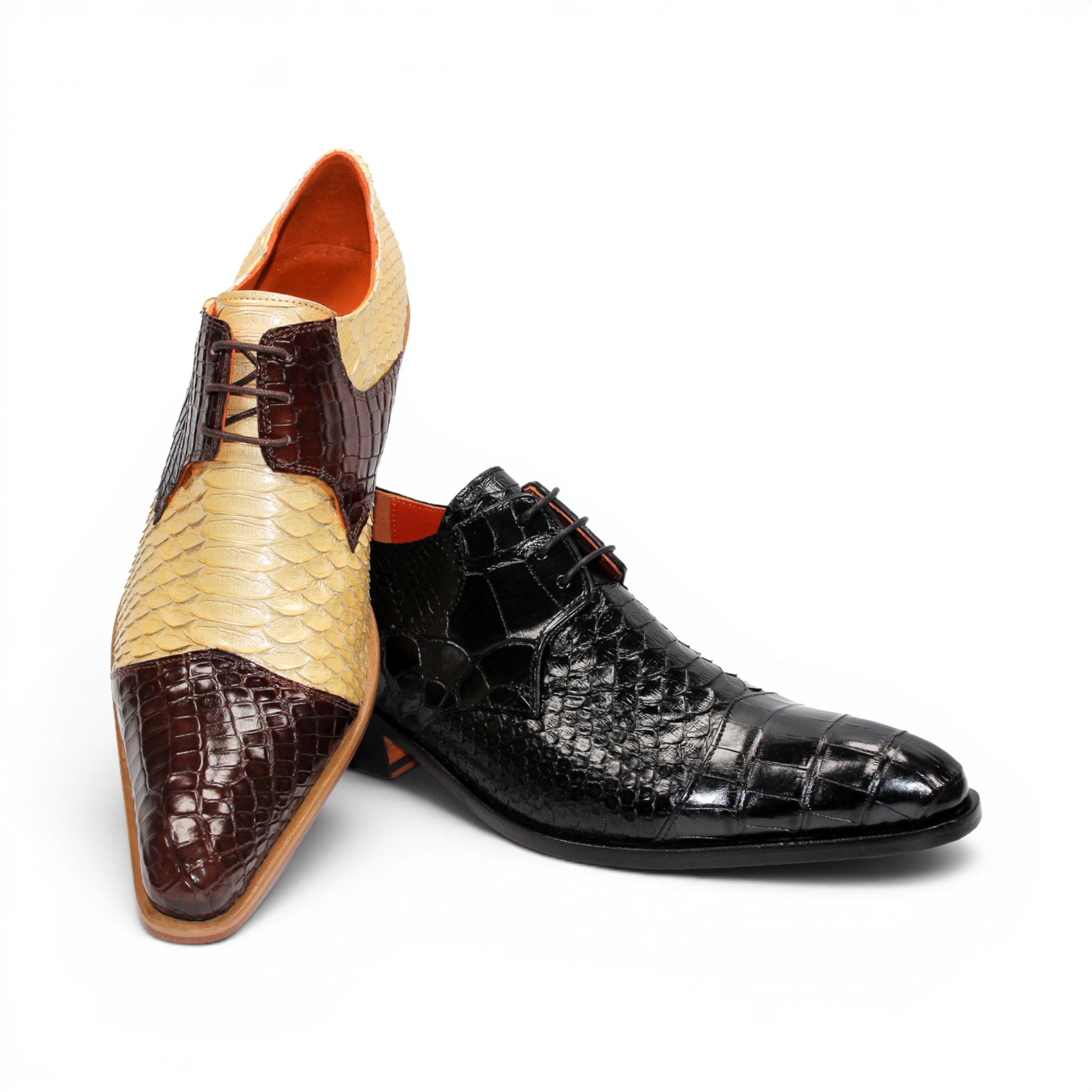 Introducing the Fennix Roger Black by Fennix of Italy—a luxury, pointed-toe dress shoe crafted in Italy from genuine alligator leather. Featuring a textured snake-skin pattern and low heel, this premium shoe is shown in profile against a white background as part of our exclusive collection.