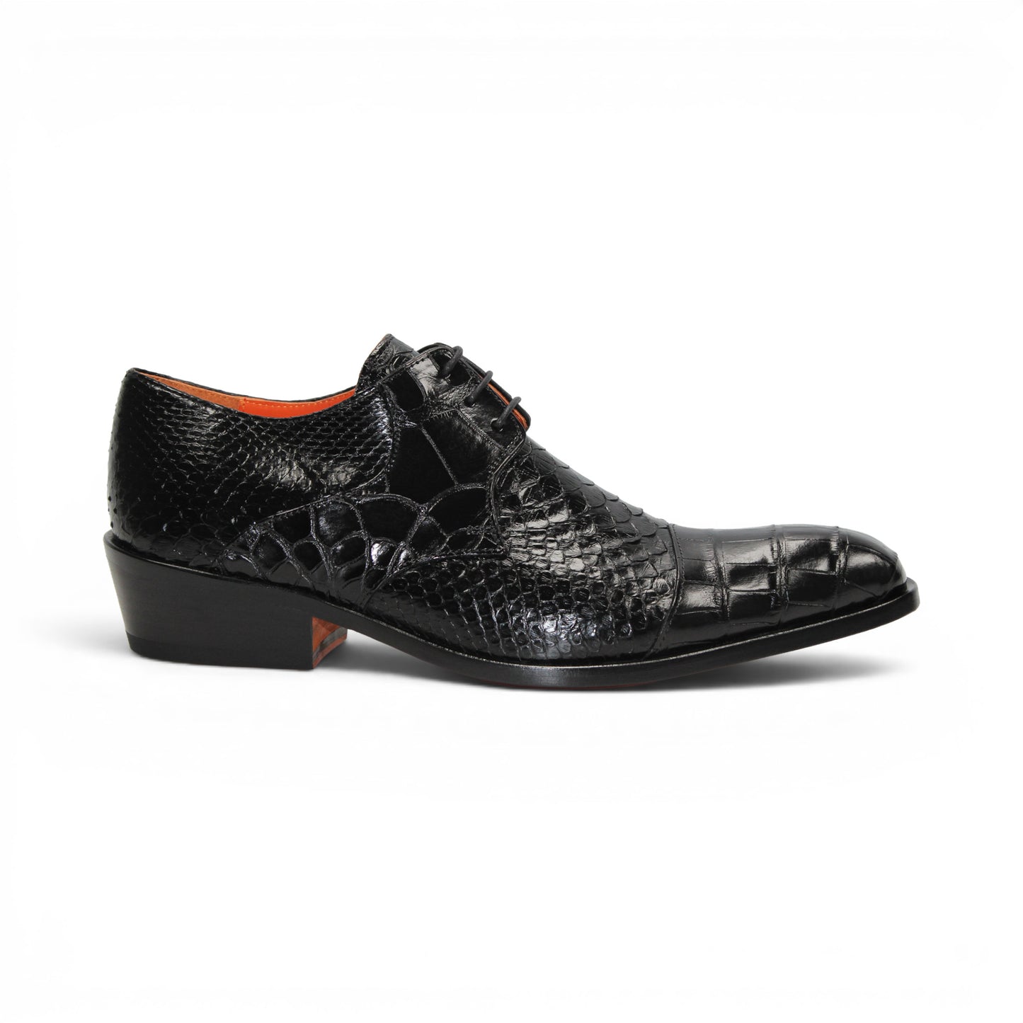Introducing the Fennix Roger Black by Fennix of Italy—a luxury, pointed-toe dress shoe crafted in Italy from genuine alligator leather. Featuring a textured snake-skin pattern and low heel, this premium shoe is shown in profile against a white background as part of our exclusive collection.
