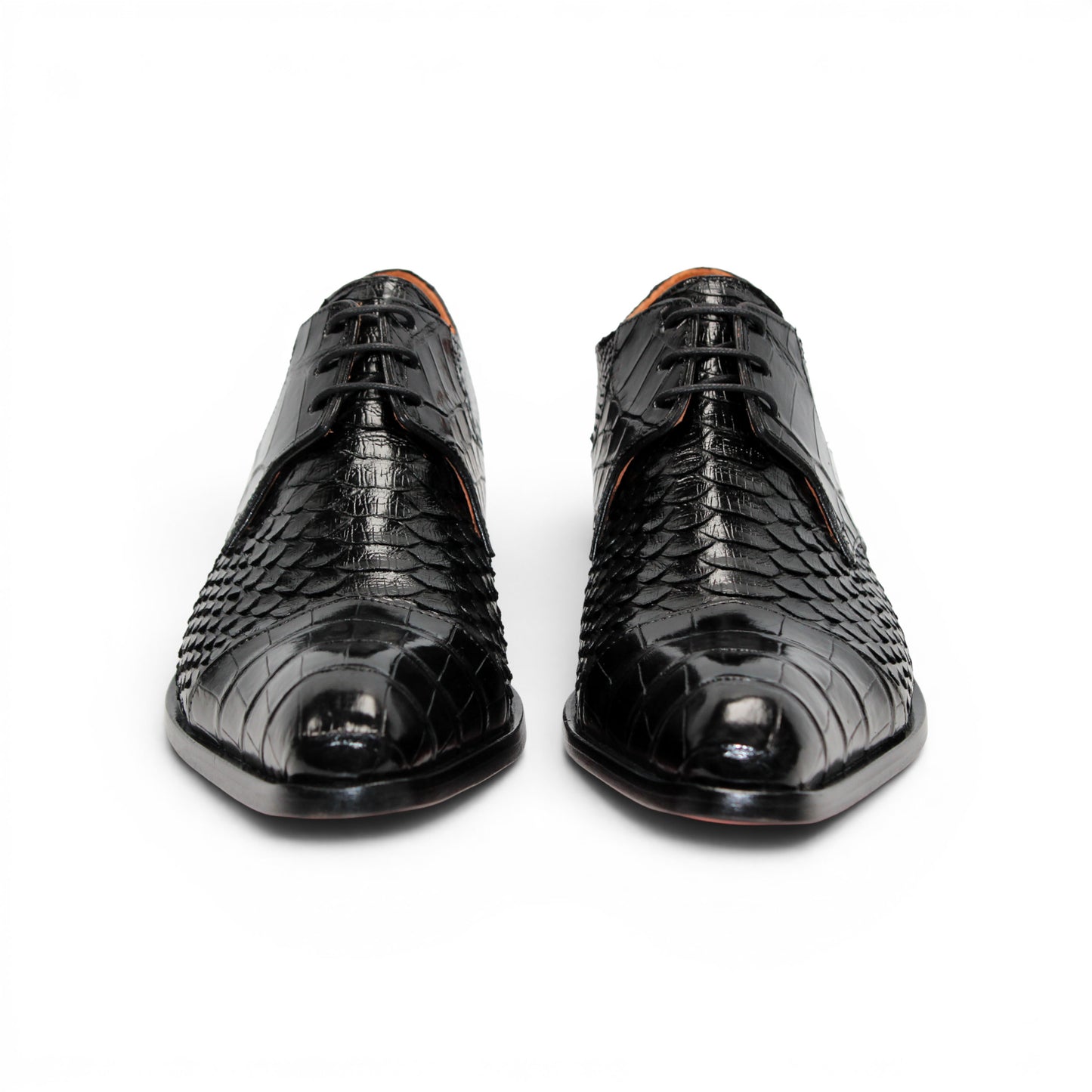 Introducing the Fennix Roger Black by Fennix of Italy—a luxury, pointed-toe dress shoe crafted in Italy from genuine alligator leather. Featuring a textured snake-skin pattern and low heel, this premium shoe is shown in profile against a white background as part of our exclusive collection.