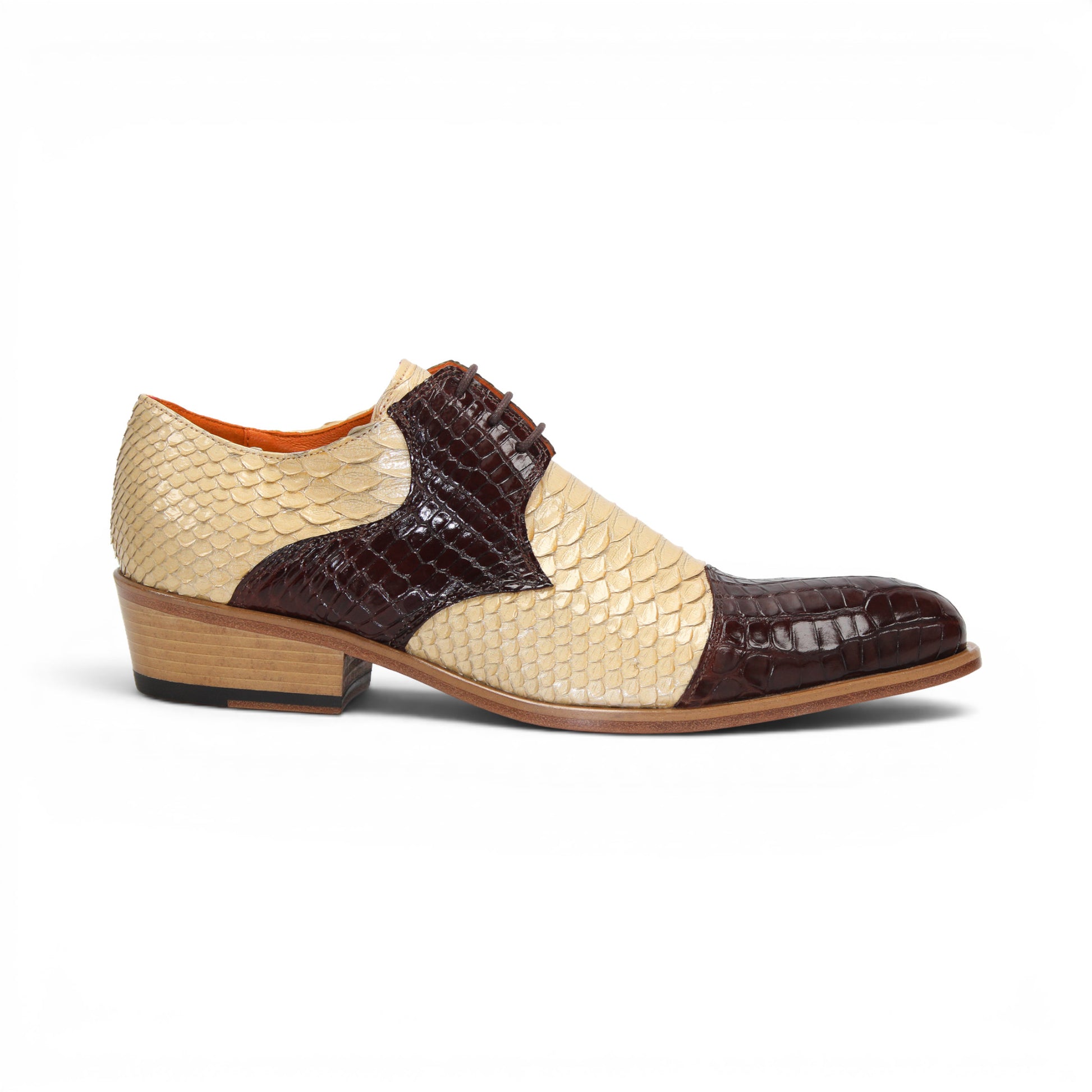 Showcased in profile on a white background, the Fennix Roger Brown/Beige by Fennix of Italy is a luxurious men's dress shoe, crafted in Italy from genuine alligator leather with beige and dark brown scales, a low wooden heel, and lace-up closure.