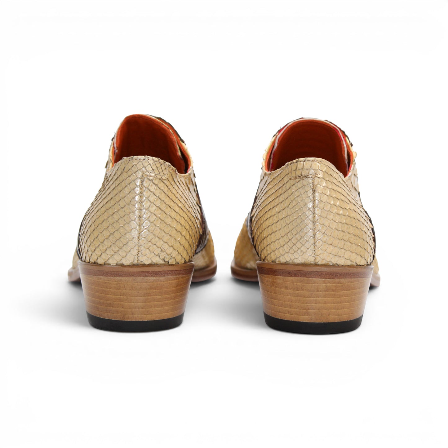 Showcased in profile on a white background, the Fennix Roger Brown/Beige by Fennix of Italy is a luxurious men's dress shoe, crafted in Italy from genuine alligator leather with beige and dark brown scales, a low wooden heel, and lace-up closure.