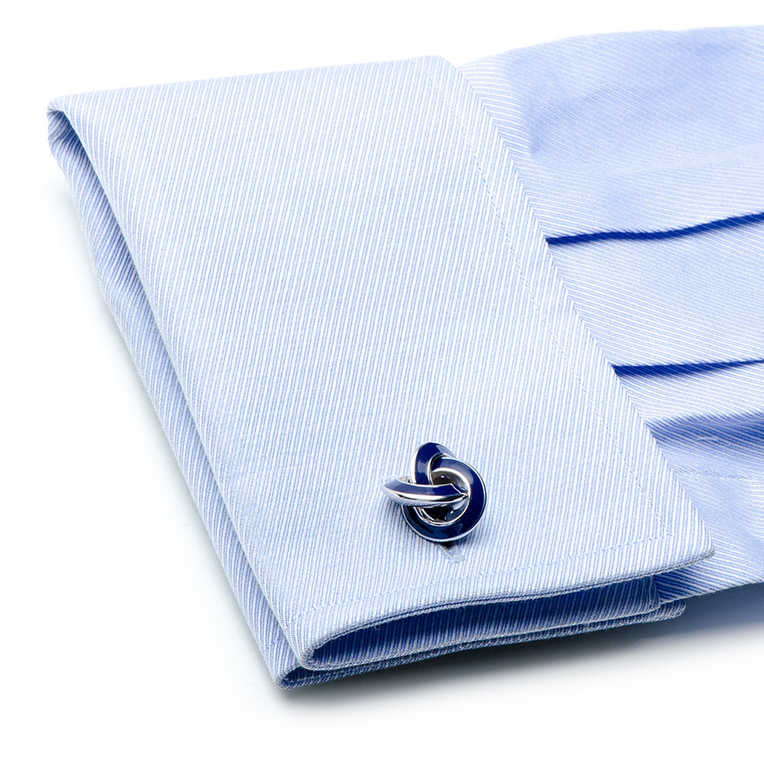 The Sterling Blue Enamel Knot Cufflinks by Cufflinks.com feature polished silver and navy knots, creating an elegant accessory for any outfit.