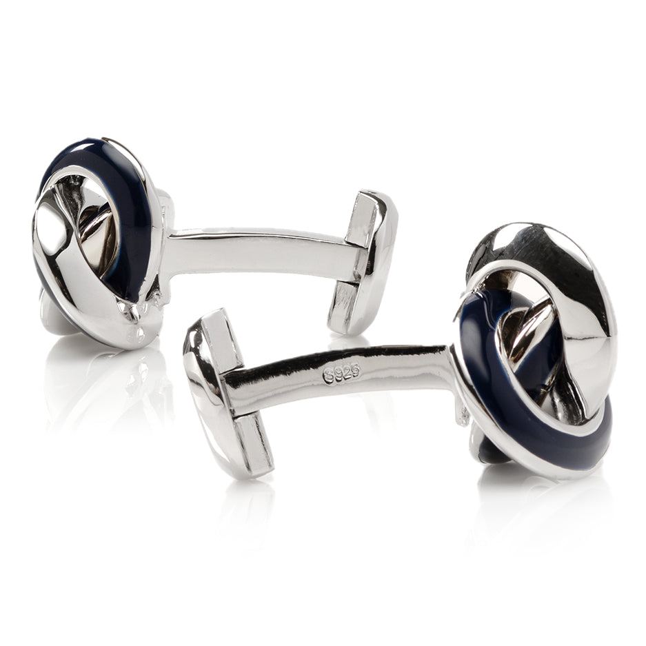 The Sterling Blue Enamel Knot Cufflinks by Cufflinks.com feature polished silver and navy knots, creating an elegant accessory for any outfit.