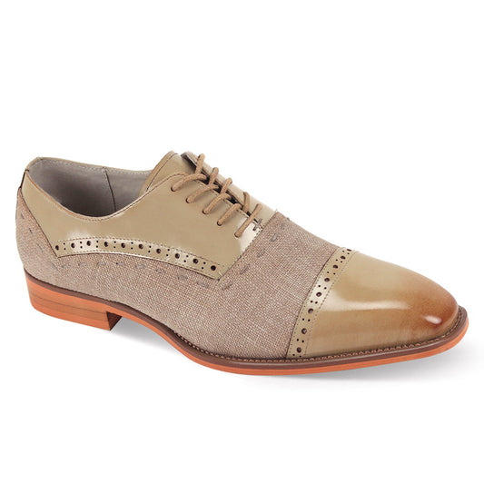 The Giovanni Reed Natural Leather Shoes by GIOVANNI are tan and brown leather dress shoes that showcase decorative cap toe stitching, perforated details, a lace-up closure, and a wooden sole.